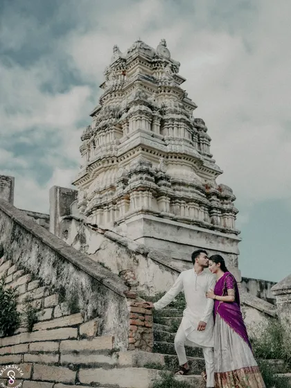 Blending love with heritage. This pre-wedding photo at a historic temple site near Bangalore shows how we can create timeless, soulful images that are rooted in culture.