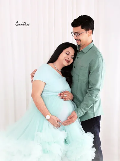 A bright, airy, and intimate moment captured in my studio. This high-key setup is perfect for creating soft, glowing portraits that highlight the gentle love and happiness of expecting parents.