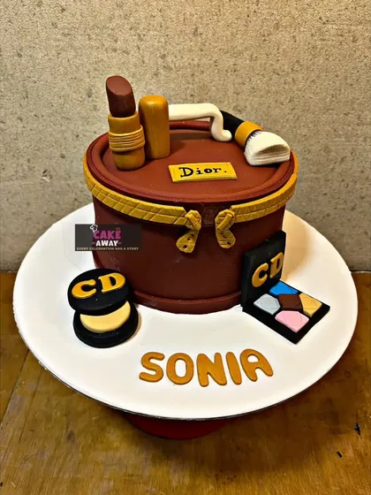 A perfect cake for a makeup lover. Every item, from the lipstick and brush to the eyeshadow palette, is handcrafted from fondant. This is a great example of how I can turn a personal passion into a unique, edible gift.