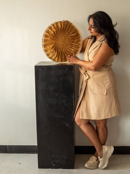 The golden bloom, caught in a quiet moment. This piece is delicate, radiant, and timeless.