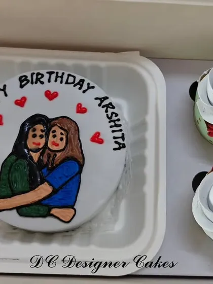 I can turn any idea into a sweet treat, like this custom hand-painted bento cake. This set, made for a birthday, includes a personalized portrait on the mini cake and two matching floral cupcakes.