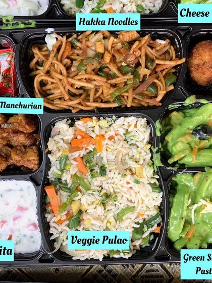 A fusion meal box with Green Sauce Pasta, Veg Hakka Noodles, Veggie Pulao, Raita, Babycorn Manchurian, and a Cheese Ball. A fun menu for a get-together.