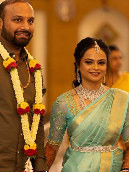 Our gorgeous client Samskruthi on her big day. She is wearing a beautiful diamond-look CZ set, including a choker, maang tikka, and a delicate vaddanam.