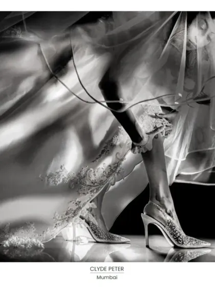 I believe wedding cinematography is an art form. This black and white shot, which won a Fearless Award, captures the quiet, artistic details of a wedding day. It’s about finding beauty in the small moments, like the bride adjusting her garter, and turning them into timeless, cinematic memories.