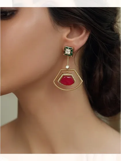 Modern geometric earrings with a fan-shaped ruby drop, perfect for adding a contemporary edge to your look.