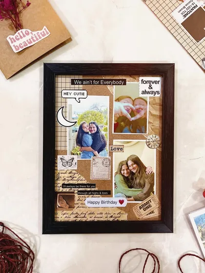 Crafting memories, one frame at a time. This scrapbook-style frame has a cool, rustic vibe with torn paper, stamps, and stickers surrounding photos of two best friends.