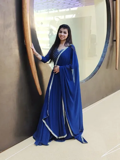 'Ek ladki ko dekha to aisa laga'. A playful, full-length shot in a beautiful blue outfit.