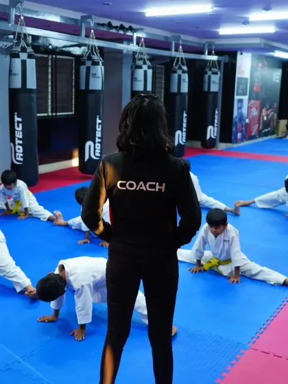 As a coach, I oversee our young students during their flexibility training. Proper guidance is essential for developing strong, healthy martial artists.
