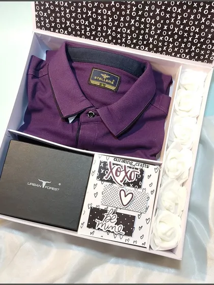 Finding the perfect gift for him can be tricky, so I love putting together these custom hampers. This one features a stylish shirt and a wallet, paired with a personalized mini-scrapbook to make it truly a one-of-a-kind anniversary present.
