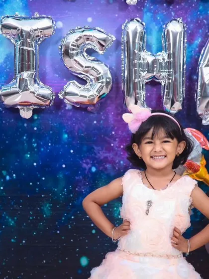 To infinity and beyond! This outer space theme is perfect for a little explorer's birthday. We created a galaxy backdrop with planets and rockets, complete with silver foil name balloons and a coordinating balloon arrangement to set the scene for an interstellar adventure.