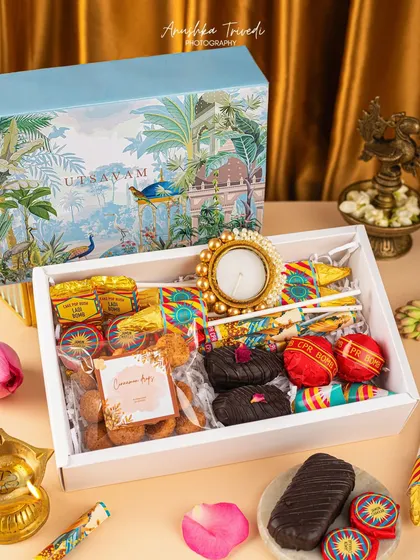 A fun and quirky Diwali hamper filled with nostalgic sweets and firecracker-themed chocolates. The styling is playful and captures the fun side of the festival.