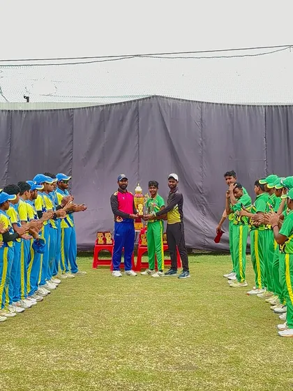 The team acknowledges the applause from the opposition.