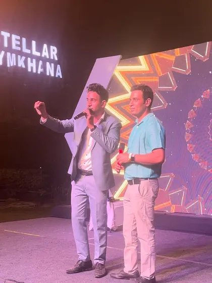 Interacting with a volunteer on stage during the Bureau Veritas corporate show. My acts are always interactive to keep the audience engaged.