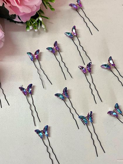 Add a playful twist to your look with these charming mini butterfly U-pins. This purple iridescent shade is one of my personal favorites.