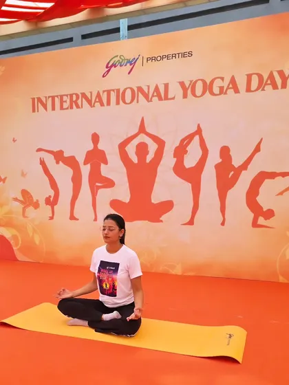 Finding a moment of peace and stillness on stage at the International Yoga Day event for Godrej Properties. Leading by example is a core part of my teaching philosophy.