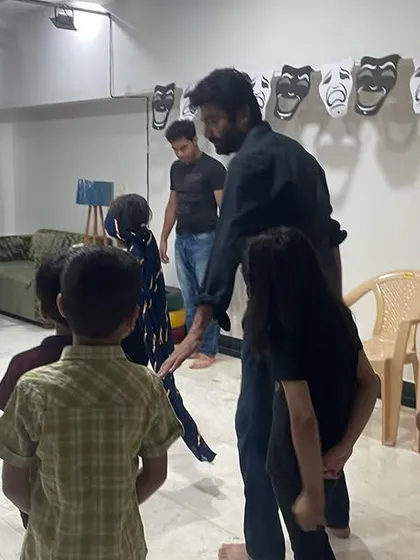 Full masti and dhamaal at our summer camp! An instructor guides a group of kids through a fun theatre game, encouraging interaction and teamwork.