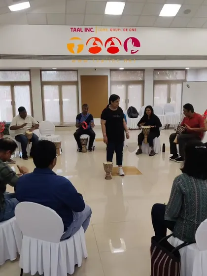 This is a snapshot from our 'Find Your Inner Rhythm' training. You can see a student facilitator taking the lead, guiding the group. Our course is hands on, giving you real practice in a supportive environment.