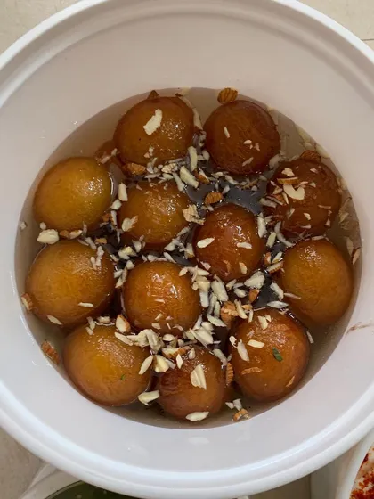 Another bowl of Gulab Jamoons.