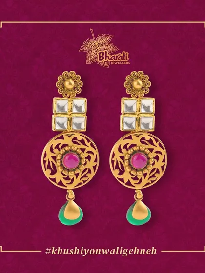 Add a touch of elegance to your look with these long, dangling earrings. The design combines traditional Kundan and intricate Jali work with colorful Meenakari drops for a vibrant, minimalist statement.