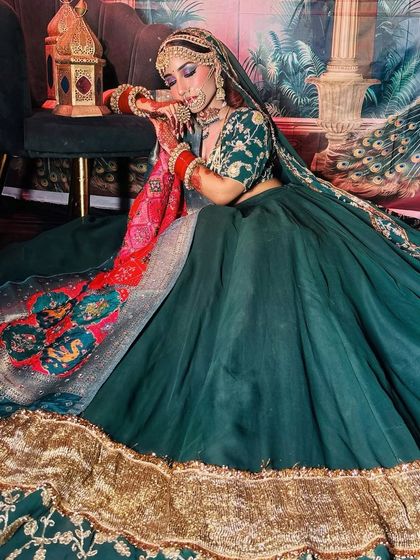 Another angle of the green lehenga look, showing the beautiful drape of the outfit.