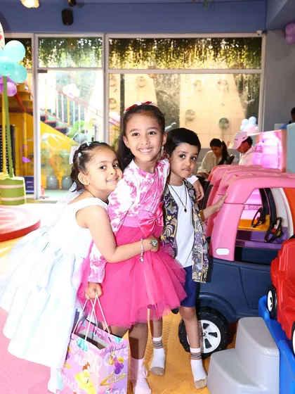 Friends celebrating together at a Peppa Pig party. Our space is perfect for hosting your child's entire group of friends.
