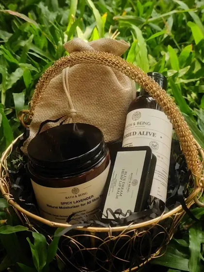 A beautifully curated custom gift basket. This hamper combines some of my favorite handmade products, including a Spicy Lavender moisturizer and Blue Dream hemp lip balm, all nestled in an elegant, reusable basket.