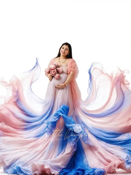 This is what maternity dreams are made of. I love creating these grand, flowing gown portraits in my studio, using fabric and light to celebrate your journey in the most beautiful way.