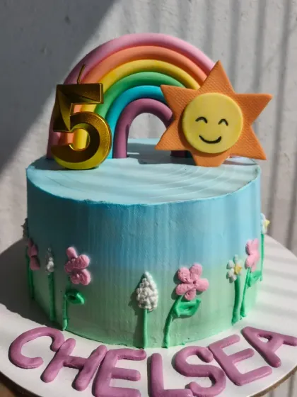 The rainbow cake shining in the sun.