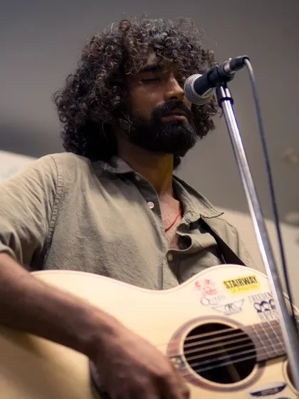 We love providing a stage for passionate singer-songwriters to connect with an audience. Here's a powerful moment from an acoustic set, where every note and lyric could be felt throughout the room.