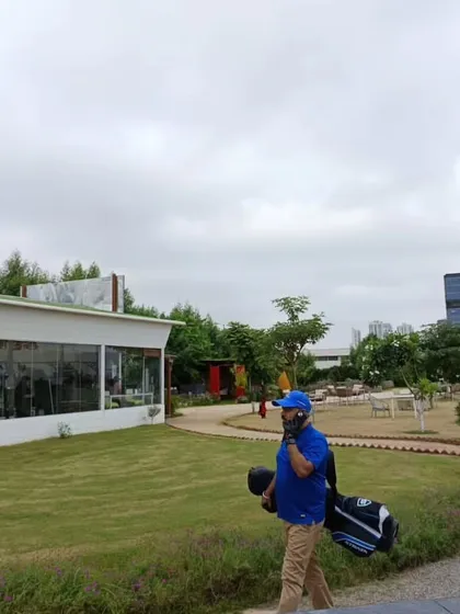 A view of our facility, showing the main building and the expansive green space that makes our range feel like a true escape.