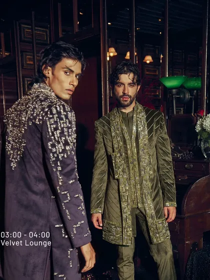 This image showcases the versatility of my velvet collection. On the left, a deep wine jacket with cascading silver embroidery. On the right, an olive green ensemble with coordinated, shimmering detail. Both are designed to make an impact in any evening setting.