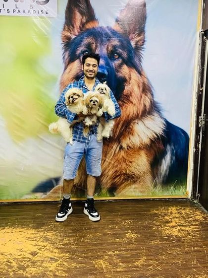 Arya, a guest with three adorable Shih Tzus, poses for a farewell photo. We love our guests and always miss them when they go home.