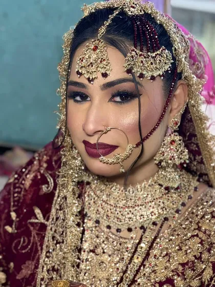 A close-up of the royal bridal look. Her eyes are the main focus, with a dark, winged-out shadow and a sharp liner.