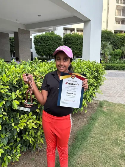 Aadya Kaushal proudly holds her Runner-Up trophy from the 15th DGC Junior/Sub-Junior Golf Tournament.