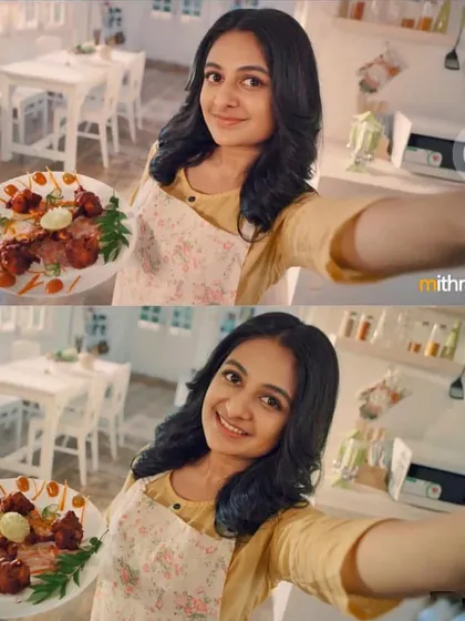A print ad still for a cooking oil brand, featuring a bright and clean kitchen setting. The makeup is fresh and natural, perfect for a lifestyle shoot.