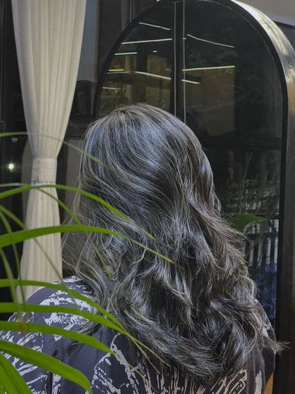 Another beautiful shot of the silver fade color, showing the result in a natural setting within the salon.