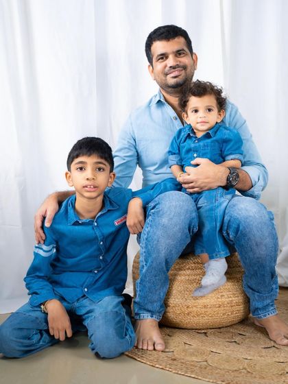 The boy gang. A father poses proudly with his two sons, creating a wonderful memory of this stage in their lives.
