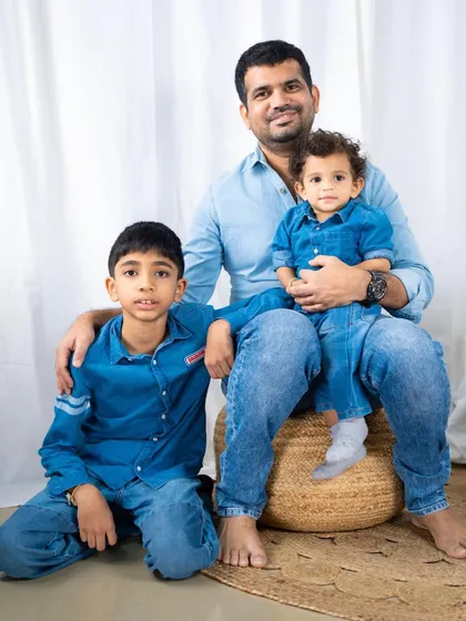 The boy gang. A father poses proudly with his two sons, creating a wonderful memory of this stage in their lives.