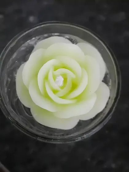 A simple and elegant floating rose candle. These are perfect for decorating a water-filled bowl for a dining table centerpiece or event decor.