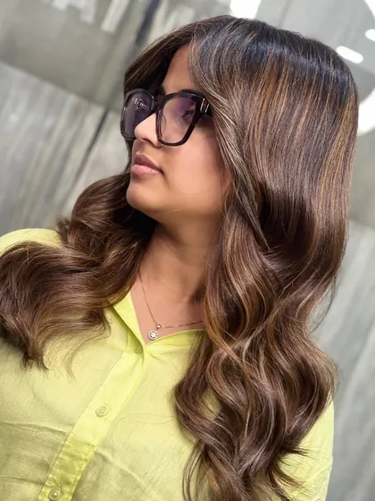 From the side, you can see how the lighter pieces frame the face. This is a great technique for brightening up your overall look.