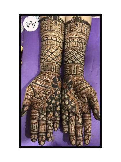 The front-hand design for the same client, featuring beautiful peacocks and intricate arm work.