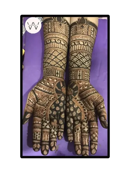 The front-hand design for the same client, featuring beautiful peacocks and intricate arm work.