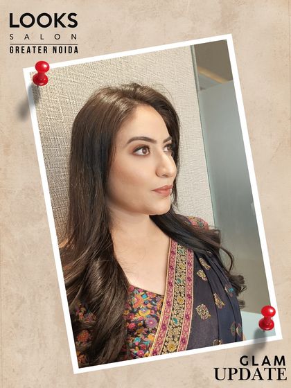 A sophisticated party look for an evening event. I created a soft smokey eye and a neutral lip color, paired with voluminous waves. This is a classic glam look that suits any formal occasion.