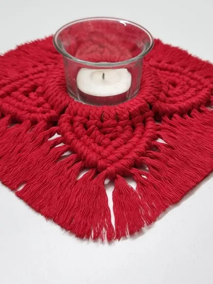 This holder is designed to perfectly cradle a standard glass votive or a traditional diya.