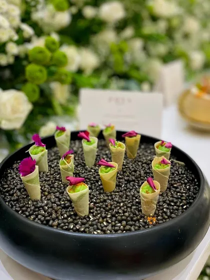 The unique presentation of our canapés is a hallmark of our Homā catering service, designed to impress guests at every turn.