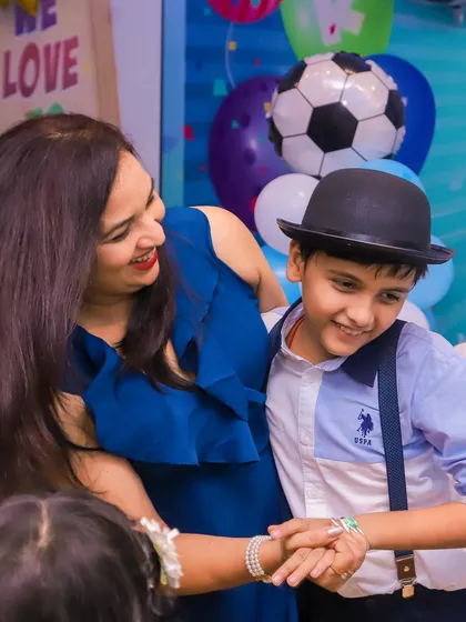 A sweet moment between a mother and her son during his birthday celebration. We focus on creating a joyful atmosphere for both kids and parents.