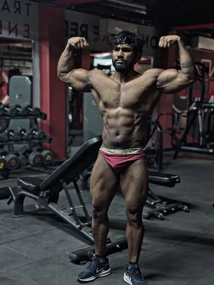 This is the result of years of consistency. A shredded, strong physique built naturally. This isn't just for show; it's the standard of excellence I bring to my own training and to yours. Ready for war.