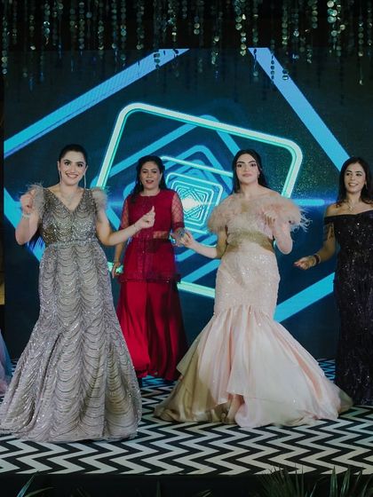 The bride's squad in a beautiful stage formation. We design our choreography to look great from every angle.