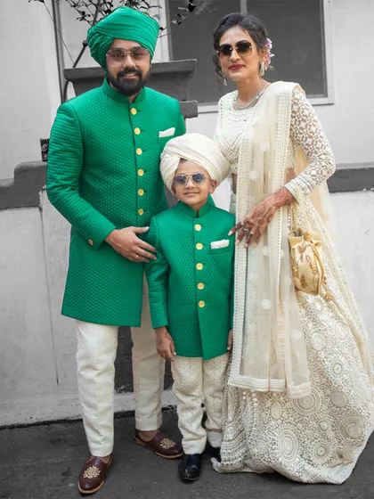 We love celebrating family bonds. Here, we designed a matching quilted green sherwani set for a father and his son, creating a powerful and adorable statement for their special occasion.
