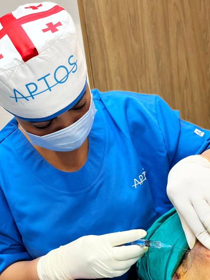 Another angle of the Aptos threadlift procedure. The cap I'm wearing signifies my training and certification with this specific, high-quality thread system.